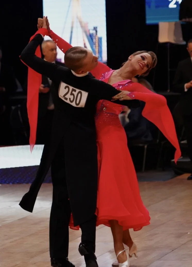 A Standard ballroom couple in competition